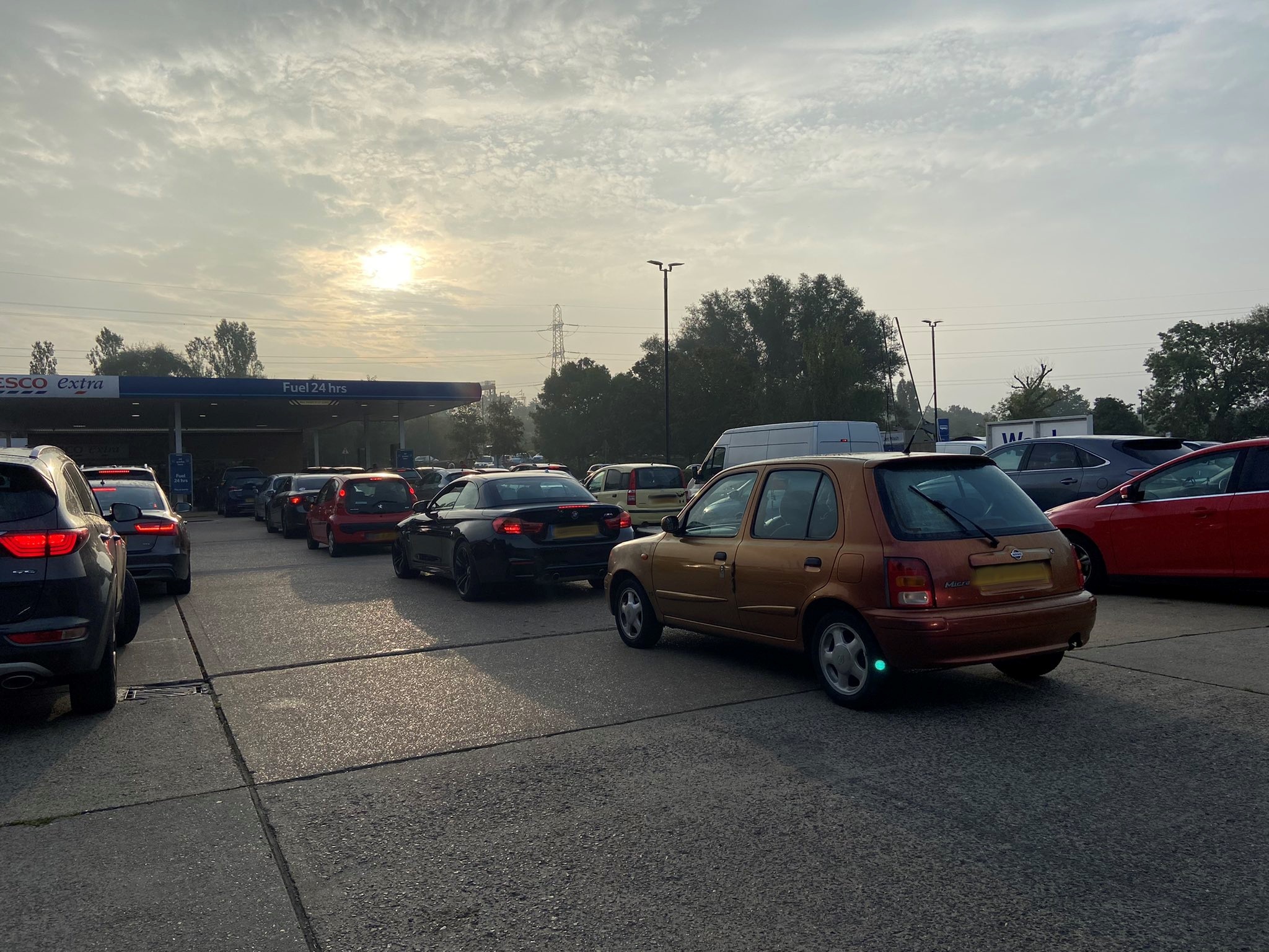 Cars queue for petrol at Tesco in Lower HIgh Street, Watford