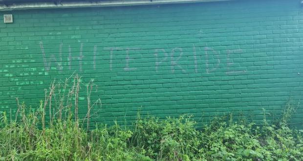 Watford Observer: 'White Pride' written on a wall in South Oxhey earlier this year. Credit: Cllr Christopher Alley 
