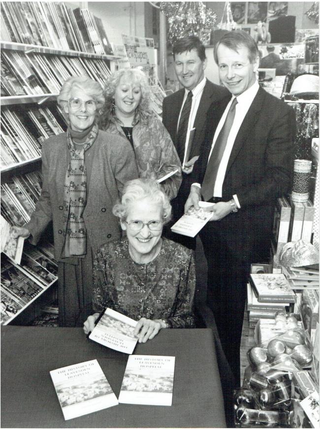 Monic Diplock (centre), Head of Occupational Therapy and staff of the Leavesden Hospital, 1990. Picture: Leavesden Hospital History Association.