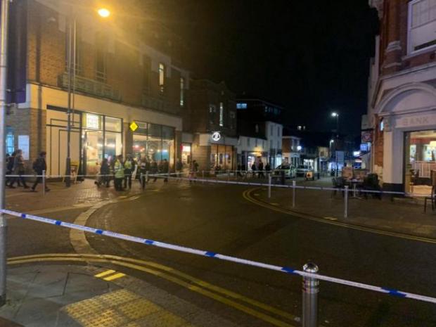 Watford Observer: Police cordon outside McDonald's and Costa Coffee in Watford High Street on February 7 2020 