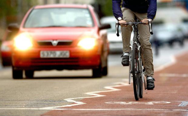 Watford Observer: Photo via PA shows a cyclist on the road near traffic.