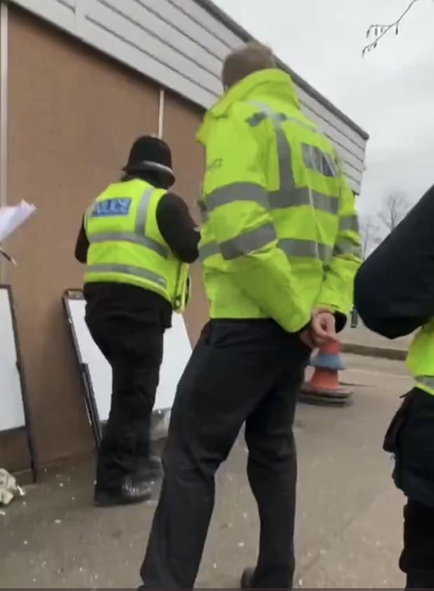 Watford Observer: There was a group of officers outside the site. Credit: Twitter