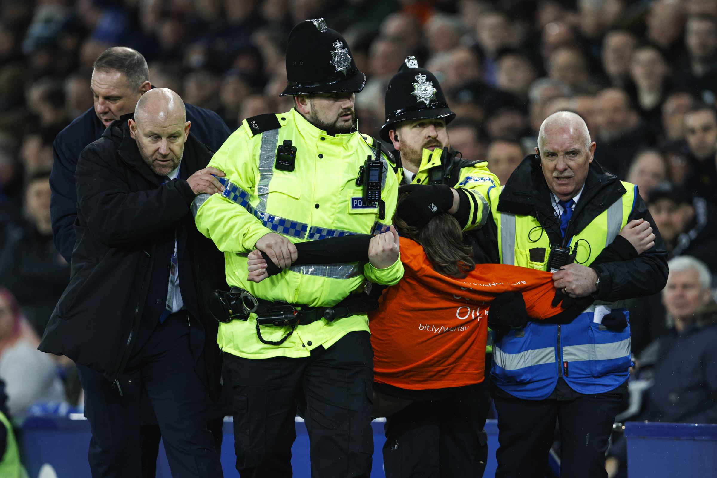 Louis McKechnie was carried out during the match at Goodison Park. Credit: PA