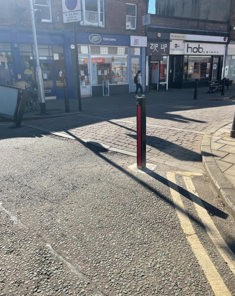 A reflective strip is at the front of the pole, but not on the other faces