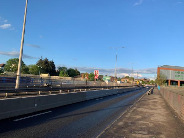 Watford Observer: One lane is closed in both directions on the A41 on the bridge that runs over the M1 by Apex Corner, which is pictured in the background. While it is clear to get onto the A41, there is gridlock getting onto Apex Corner