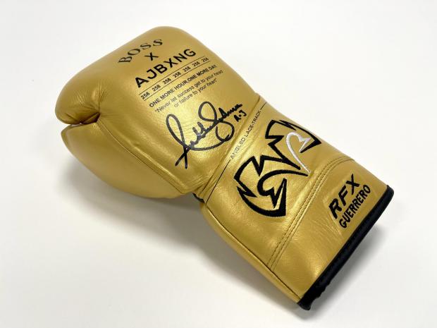 Watford Observer: AJ's signed golden glove