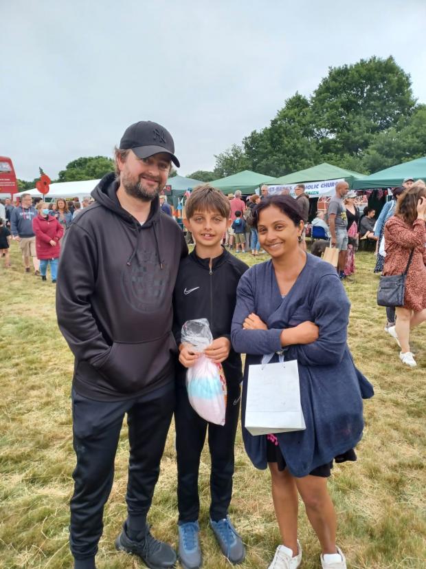Watford Observer: Left to right: Simon, Dylan and Shehara Harrison went to watch their daughter Sophia perform. Picture: Kimberley Hackett