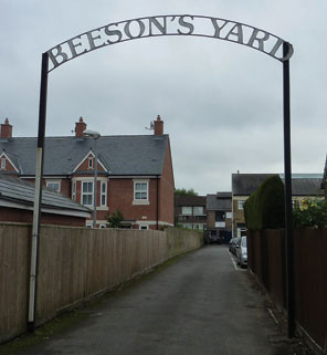 Watford Observer: The 19th Century sign for the former Beeson's Yard.