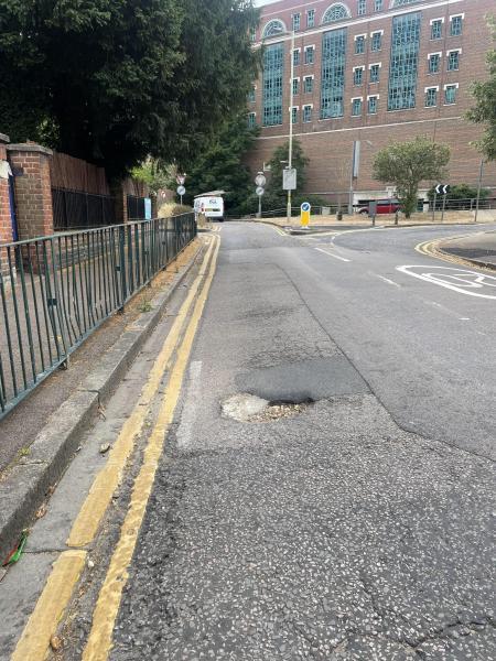Watford Observer: The pothole outside Central Primary School, Grosvenor Road
