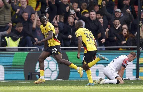 Watford Observer: The Hornets' scorer celebrates with Edo Kayembe. Watford Observer: The Hornets' scorer celebrates with Edo Kayembe.