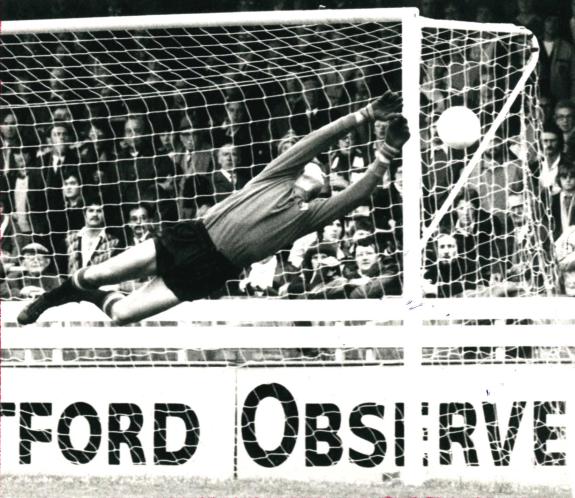 Watford Observer: Rankin goes full length to make a flying save Watford Observer: Rankin goes full length to make a flying save