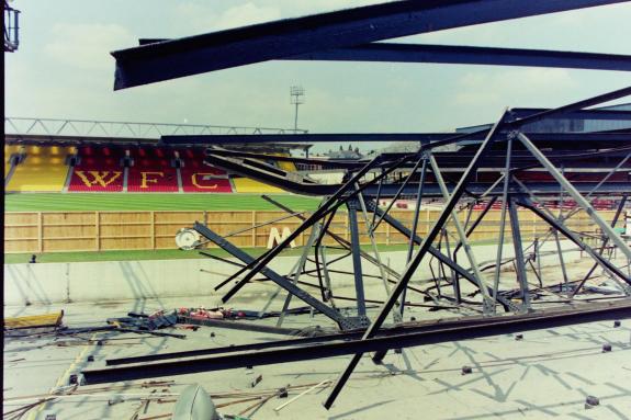 Watford Observer: The 'W' and 'O' lean up against the hoarding that was erected while the redevelopment was taking place Watford Observer: The 'W' and 'O' lean up against the hoarding that was erected while the redevelopment was taking place