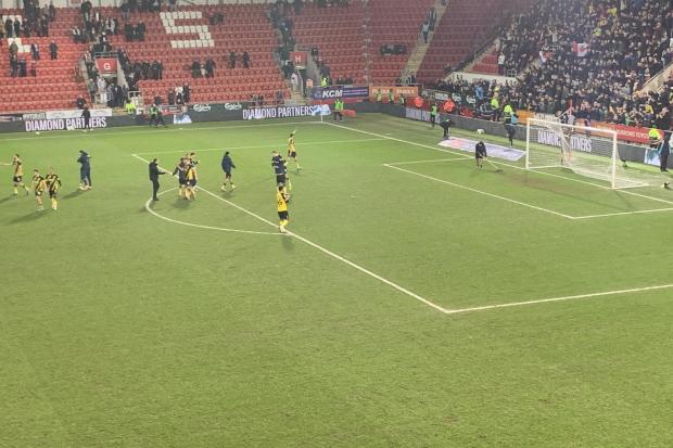 Watford's players celebrate at the end