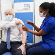 Prime Minister Boris Johnson receives his booster jab of the coronavirus vaccine at St Thomas Hospital in London, as the Government accelerates the Covid booster programme to help slow down the spread of the new Omicron variant Photo: PA