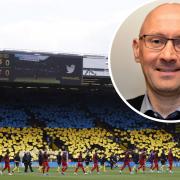 Watford supporters show their support for the people of Ukraine - but Brett Ellis says some might ask why we are vocal for Ukraine but not Yemen. Picture: Action Images