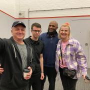 Artur, left, and Justyna McIvor from Szaniec with Luther Blissett at Woodside Leisure Centre where the club will now operate its collection from. Credit: Lauren Fox