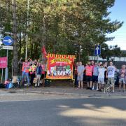 Strike action outside Royal Mail's delivery office in Watford on Friday. Image: Twitter/@Fllwthebear