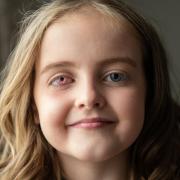Daisy Passfield, from Abbots Langley, has had a pink sparkly prosthetic eye fitted. Image: SWNS