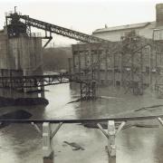 The gas works in Lower High Street surrounded by flood water. Image: Watford Museum