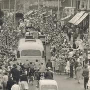 Crowds line St Albans Road to watch the carnival parade in the 1950s. Image: Watford Museum