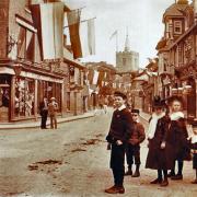 Church Street on Coronation Day, 1902, with the shop fronts prominent.