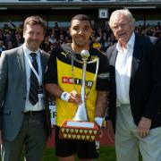 Oli presenting the Player of the Season trophy to Troy Deeney.