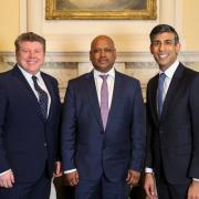 Left to right: Watford MP Dean Russell with Enoch Kanagaraj, the founder and chief executive of One Vision, and Prime Minister Rishi Sunak.