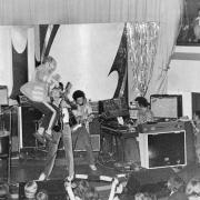 Elton John leaps across the stage at Baileys in May 1976.
