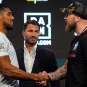 Anthony Joshua and Robert Helenius shake heads at today's pre-fight press conference