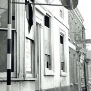 The smashed windows of the Leathersellers' Arms in November 1962