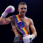 Reece Bellotti celebrates becoming a two-time Commonwealth champion