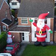 'When the neighbours install the giant Father Christmas in the garden...' Image: Alistair Allen