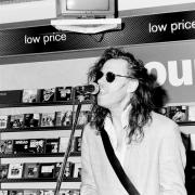 Bob Geldof found himself performing in front of the 'low price' selection of CDs