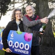 Malcolm and Rebecca Haines officially celebrate their National Lottery win.