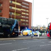 Police and the ambulance service outside Watford Junction yesterday (February 6).