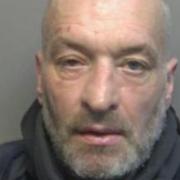 Darren Lane is wanted by police and is known to frequent Watford.