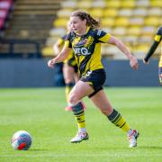 Alli Palisch in action at Vicarage Road