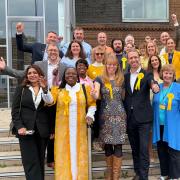 Peter Taylor celebrating with fellow Liberal Democrats on winning all 12 council seats (Image: Peter Taylor)