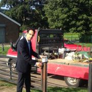 Conservative mayoral candidate George Jabbour shows off the new padlock and metal box at Watford Rugby Club