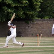 The stumps are rearranged in Watford Town's victory over St Albans. Picture: Len Kerswill