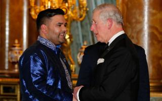 The King speaks to music producer Naughty Boy. Picture: PA