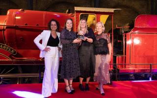 Beatrice Edwards (centre left) and Elizabeth Thomas (centre right) from Warner Bros. Studio Tour London - The Making of Harry Potter, which won the Large Visitor Attraction of the Year category,  with Fiona Pollard from VisitEnland and Alex  Polizzi