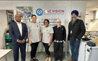 One Vision founder & CEO Enoch Kanagaraj with HR staff Pavan Gill and Parmila Minhas, Food HUB manager Nirmala Singhvi MBE and Chair of Trustees Harjit Singh DL.