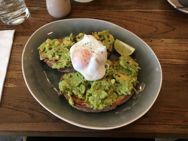 Watford Observer: Avocado on toast with chilli and lime, and a poached egg