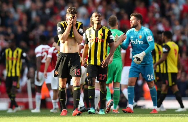 A disappointed Craig Cathcart at full-time after putting through his own net for Arsenal's first goal. Picture: Action Images.