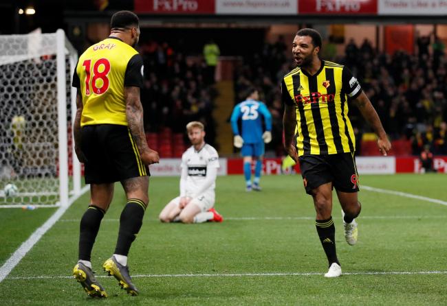 Andre Gray and Troy Deeney celebrate after Watford's third goal. Picture: Action Images